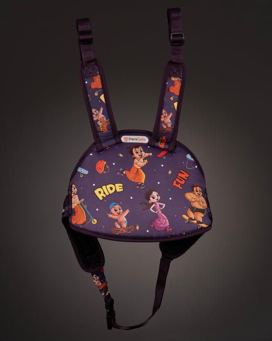 Child safety seat with cartoon character design on a dark background