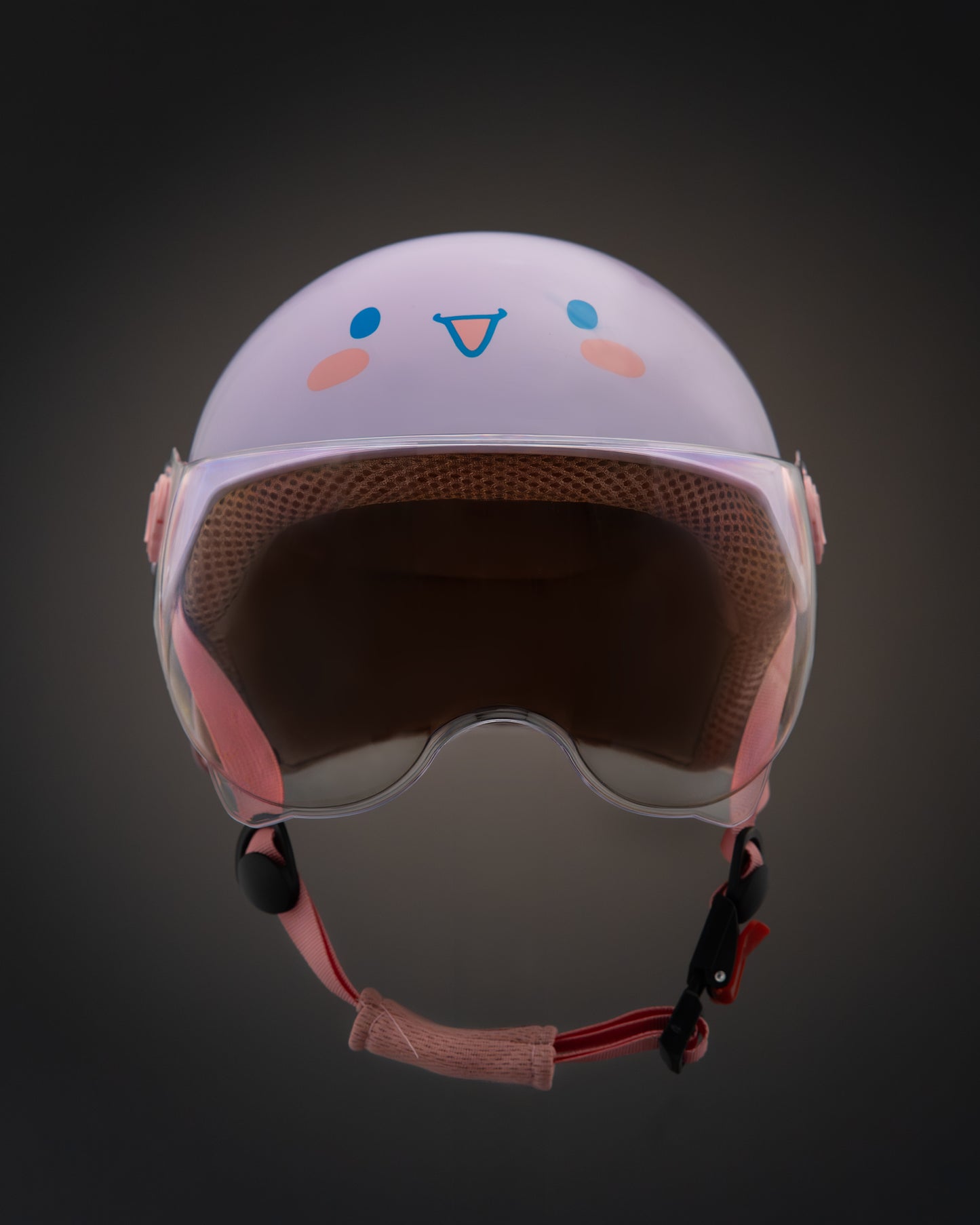 ParaSafe Purple Children's helmet with cartoon face design on a dark background