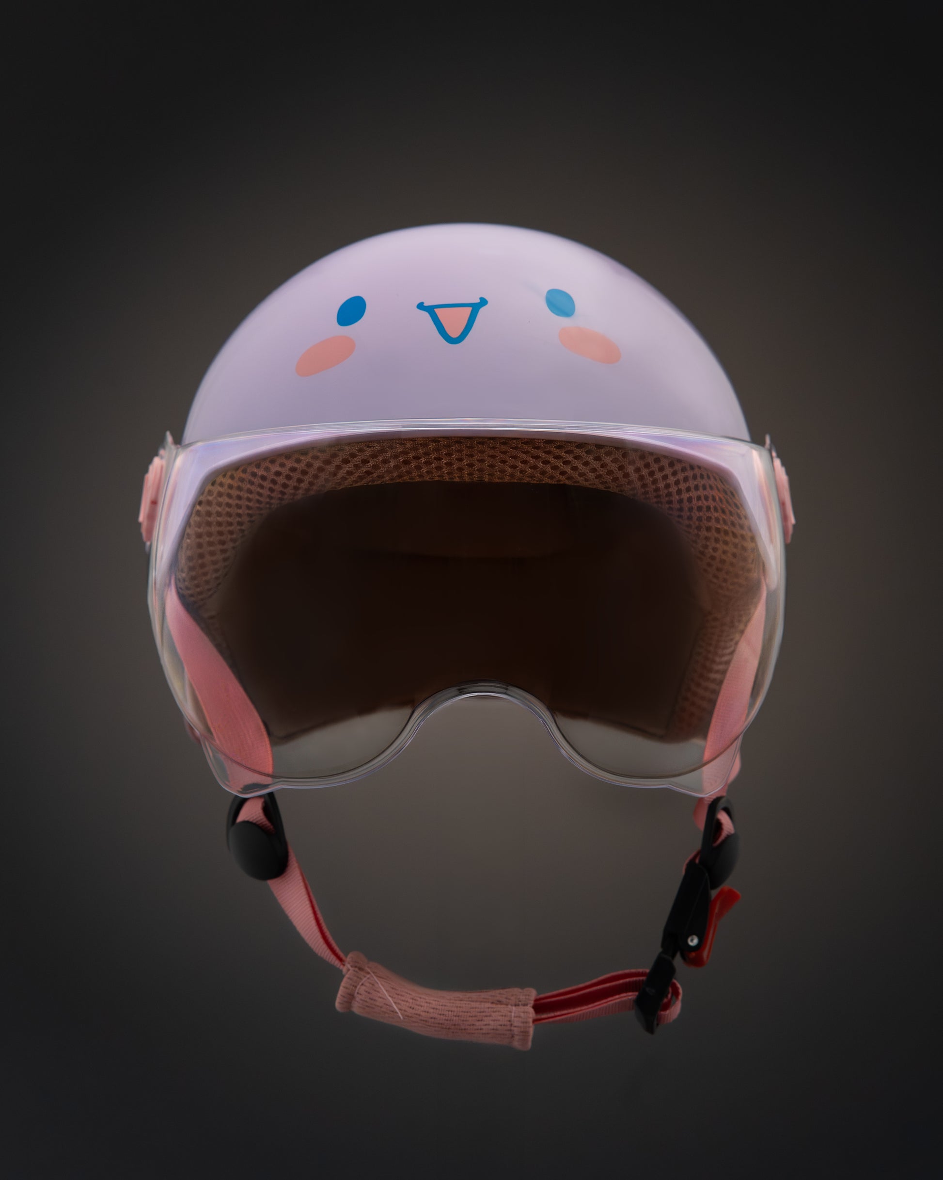 ParaSafe Purple Children's helmet with cartoon face design on a dark background
