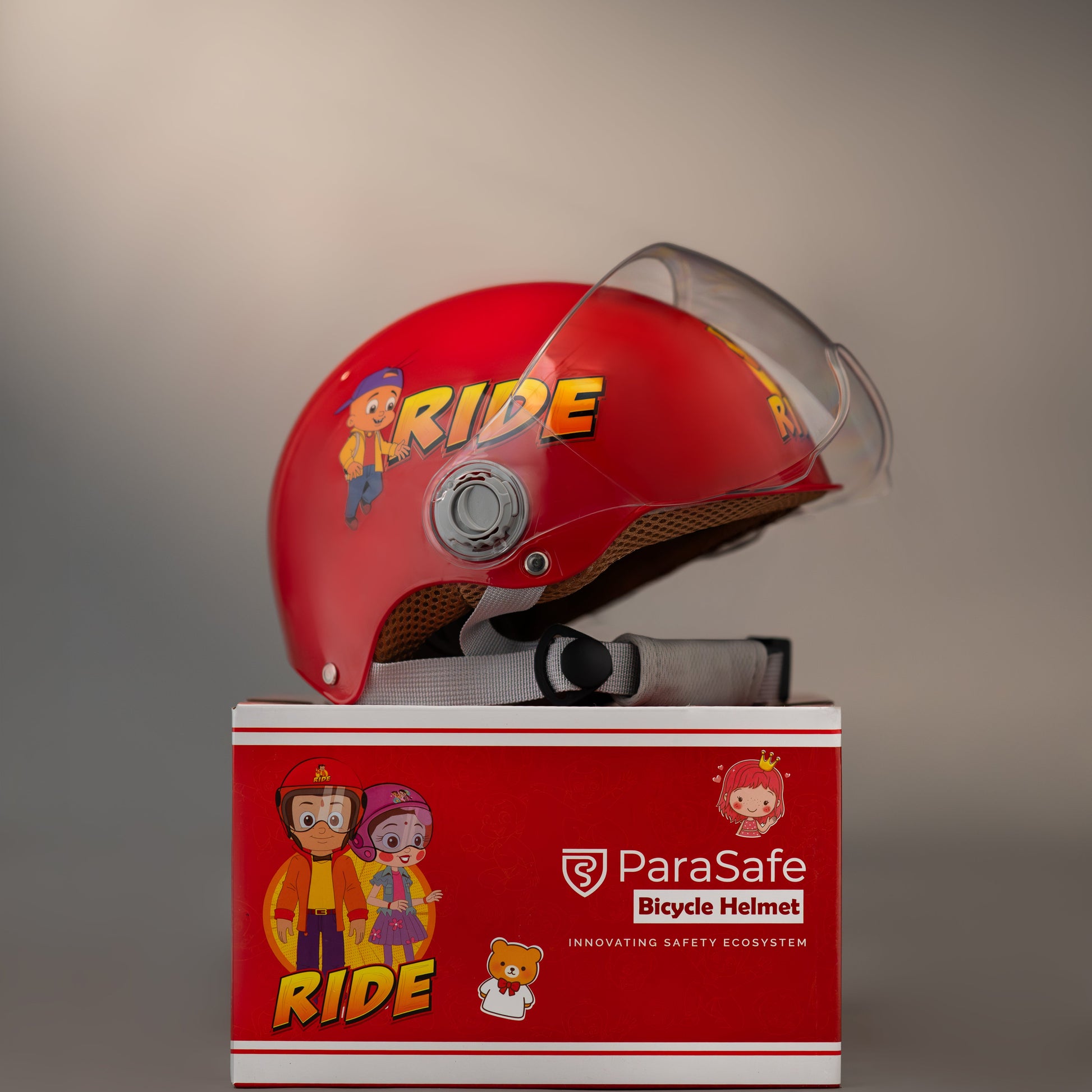 ParaSafe Red bicycle helmet with clear visor on a matching ParaSafe branded box against a gray background