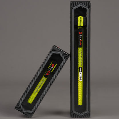 Two ParaSafe Green LED Wearable strips in packaging on a gray background