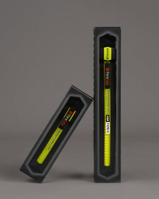 Two Green LED Wearable strips in packaging on a gray background
