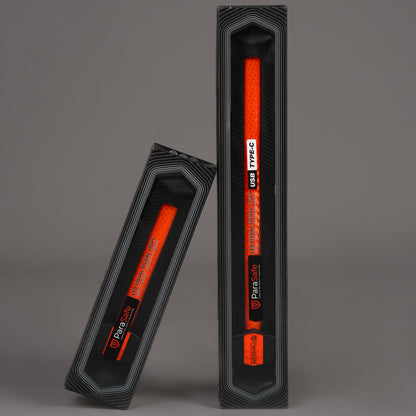 Two ParaSafe Red LED wearable strips in black packaging on a gray background