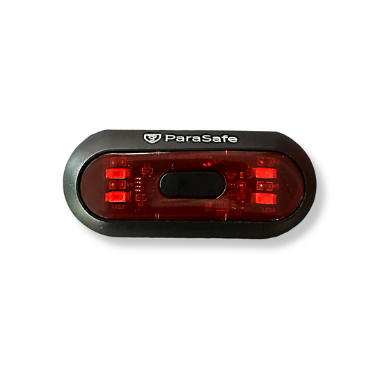Red safety light with 'ParaSafe' branding on a white background